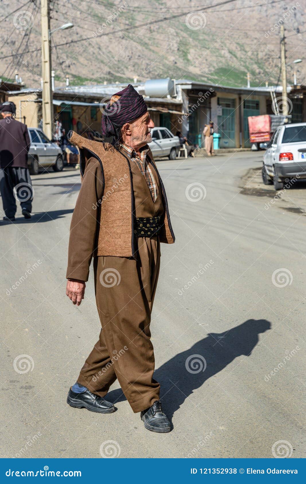 Kurdish Man In Traditional Clothing On The Street Of