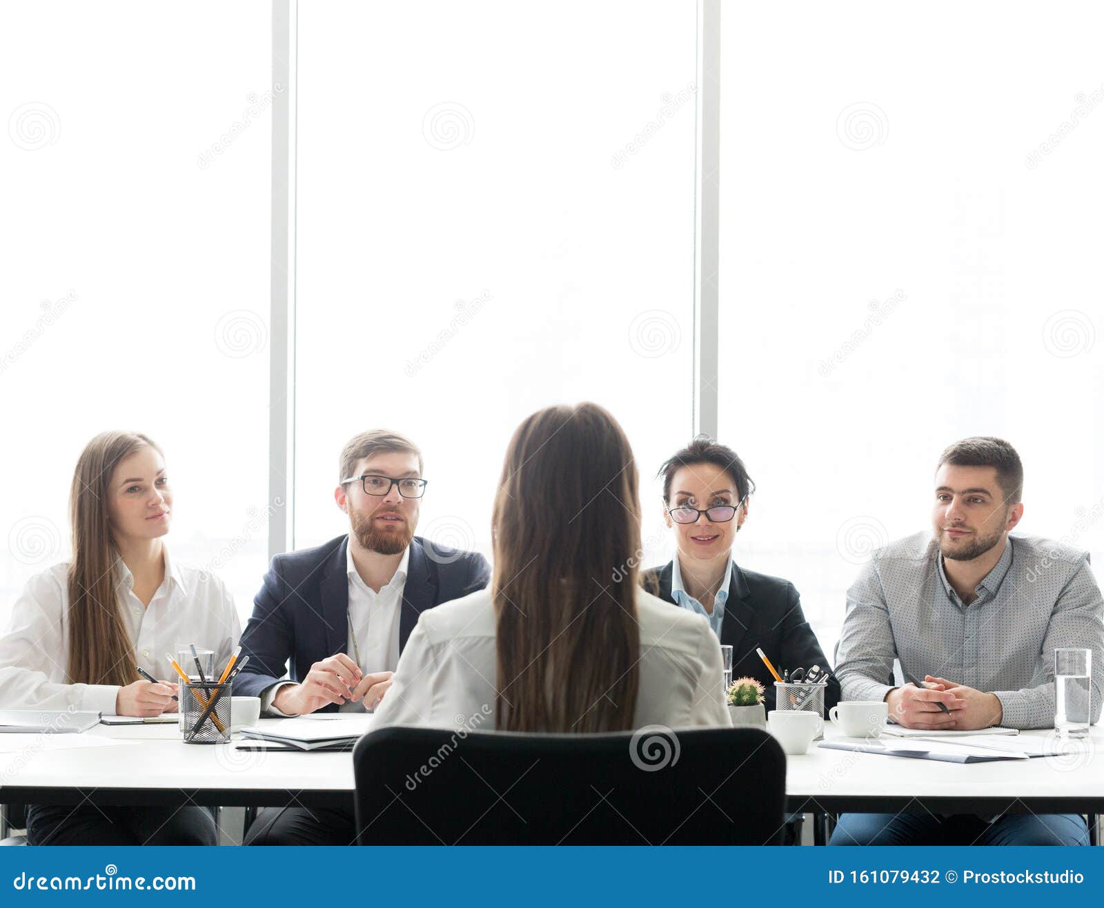 HR managers having job interview with female candidate