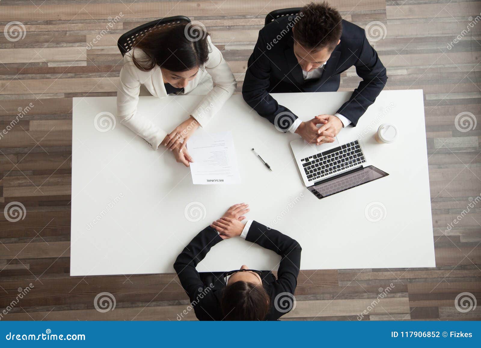 hr managers interviewing female job applicant, top view from abo