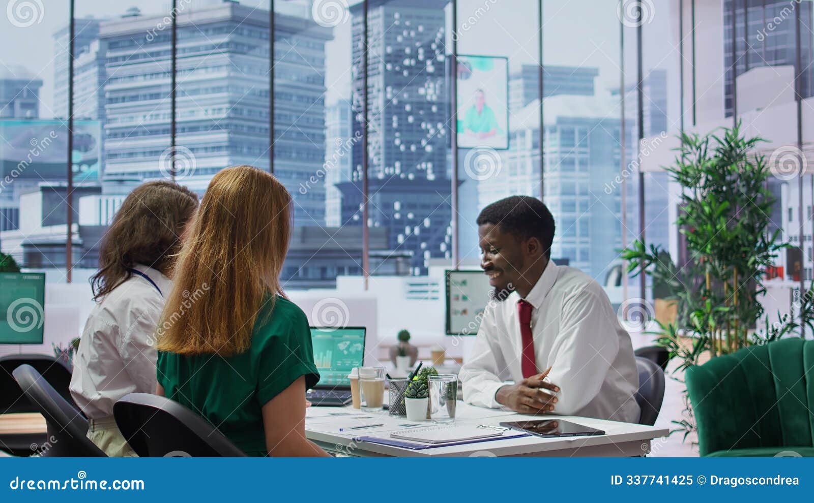 hr recruiters team greeting a job candidate at an interview with a handshake