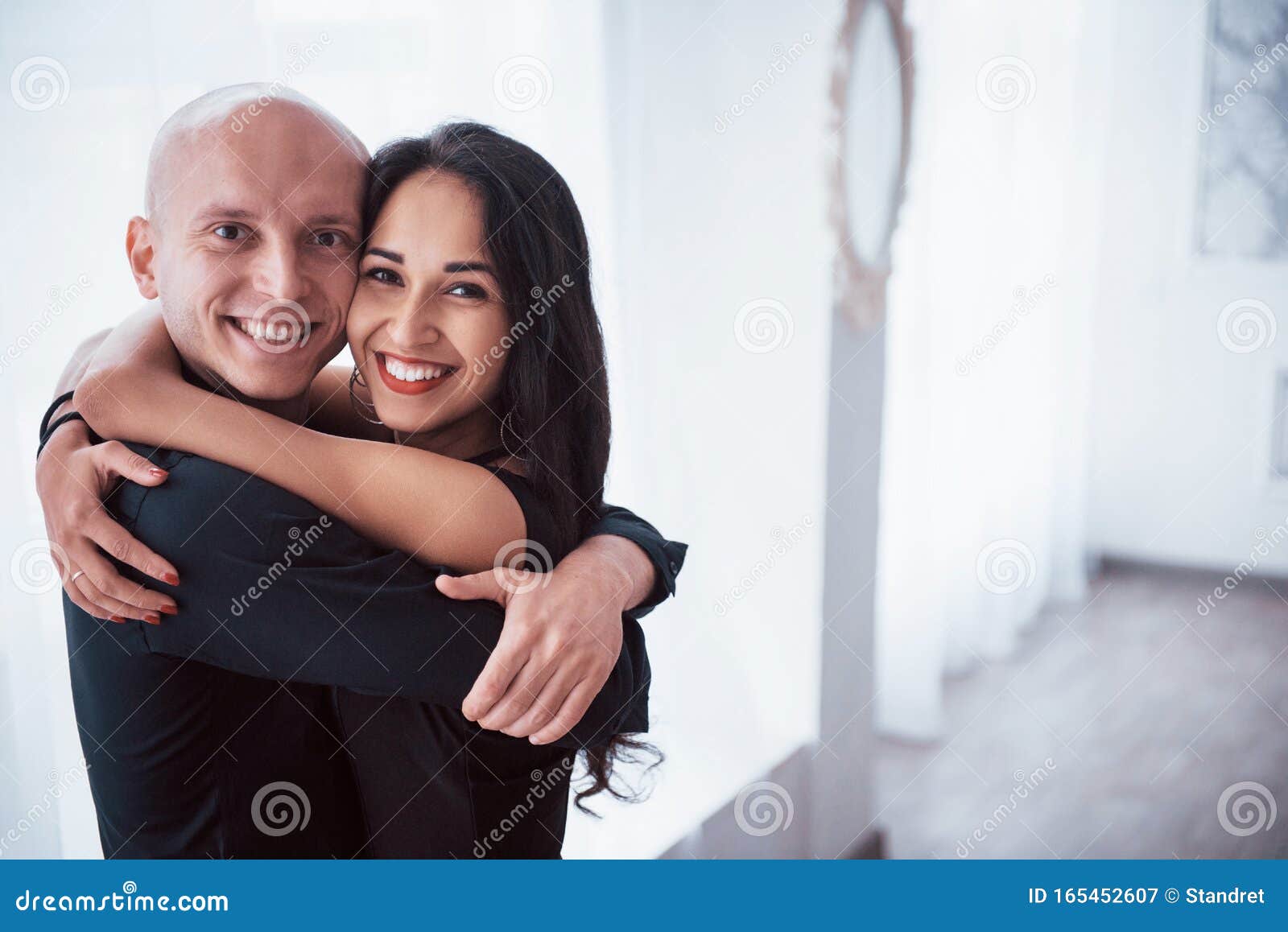 girl and bald guy