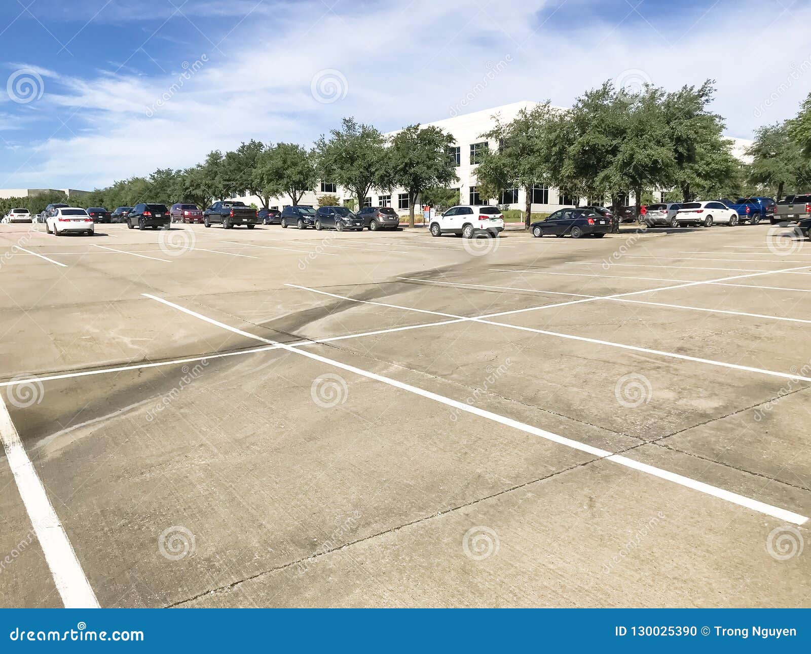 Huge Empty Urban Parking Lot On Cloud Blue Sky In Texas Usa Stock