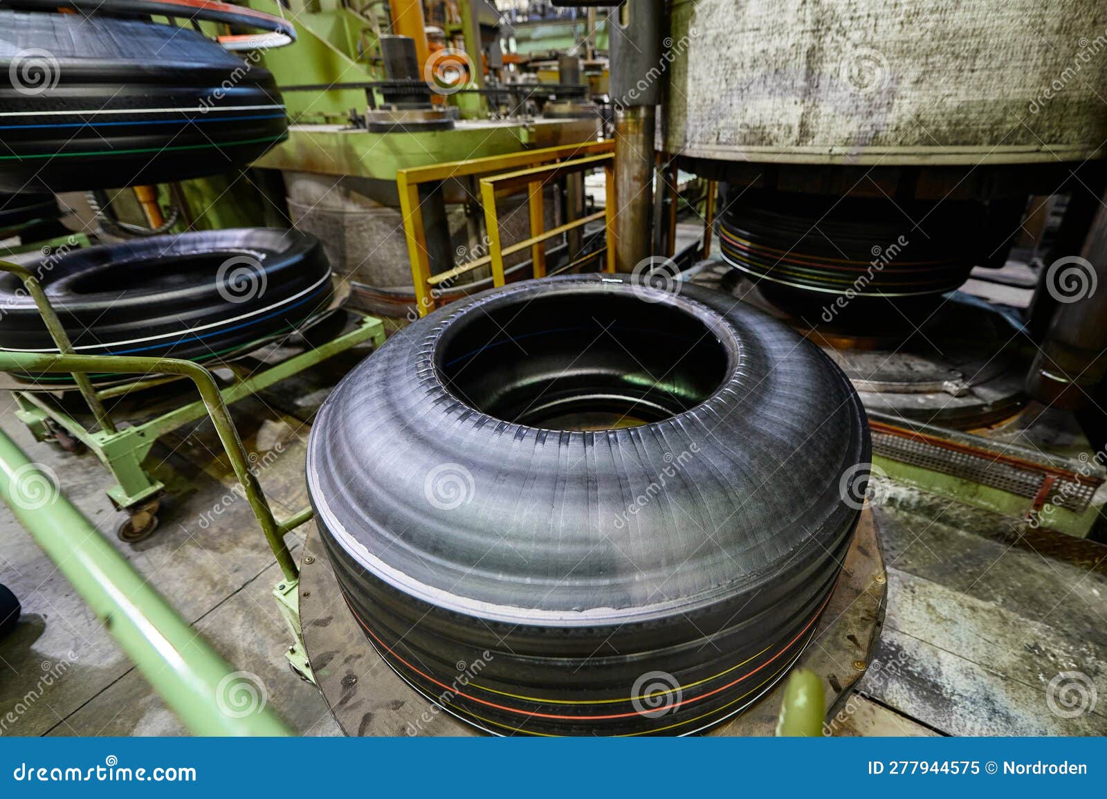 Huge Raw Tire before Vulcanization Process by Press Machine Stock Image