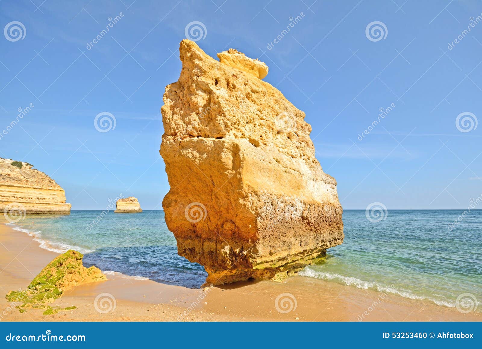 huge rock at the cliff beach of praia da marinha, lovely hidden beach near lagoa algarve portugal