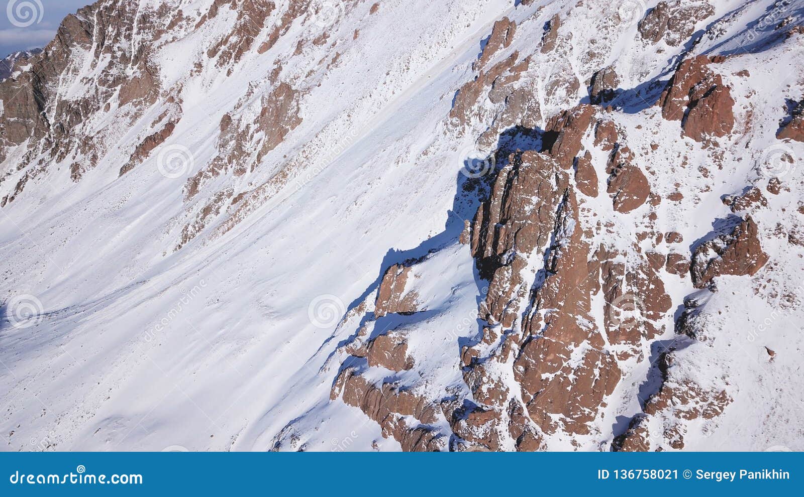 Huge Rocks Covered With Snow Ledges From The Snowy Mountains Stock Image Image Of Range Side Huge Rocks Covered With Snow Ledges From The Snowy Mountains Stock Image Image Of Range Side