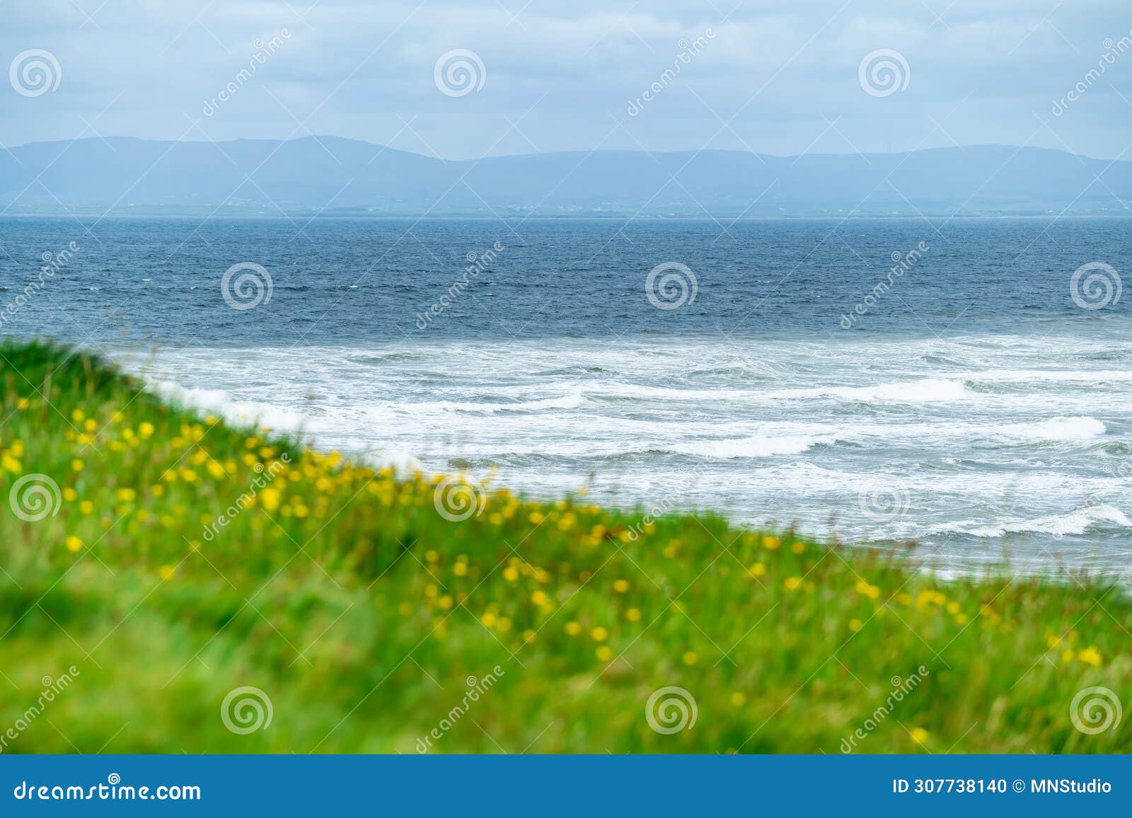 huge waves rolling at tullan strand, one of donegal's renowned surf beaches