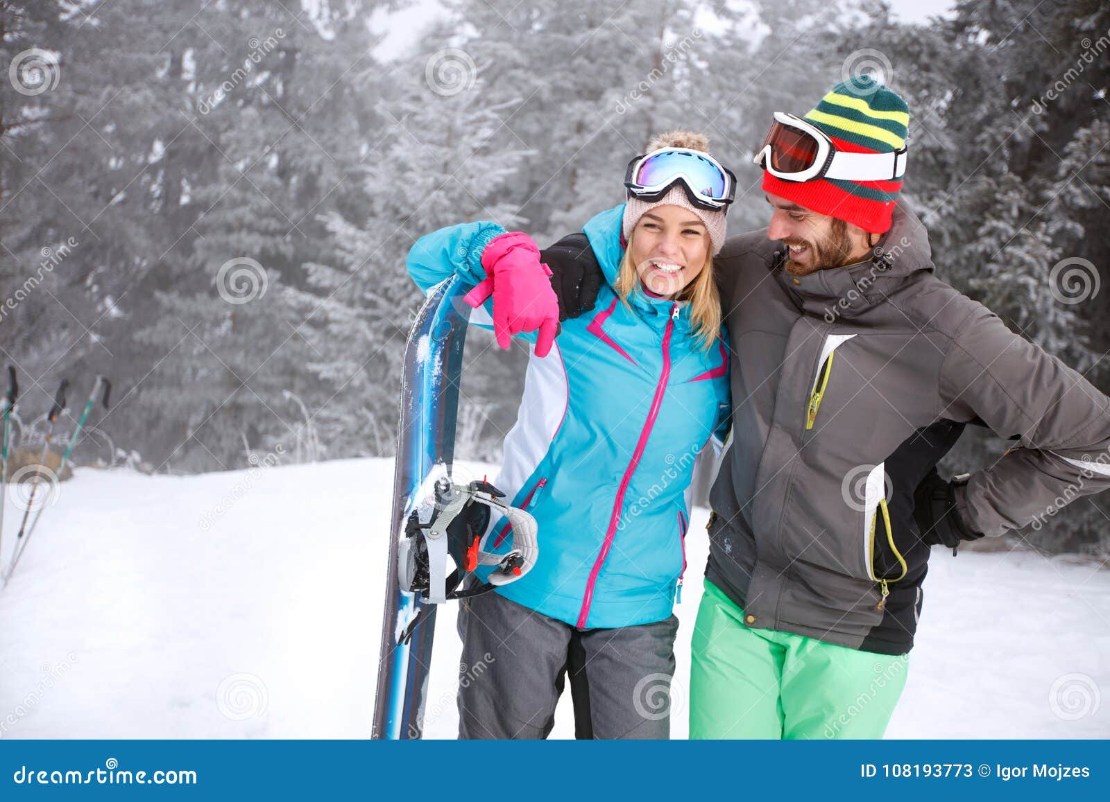 hugged couple on skiing young hugged couple