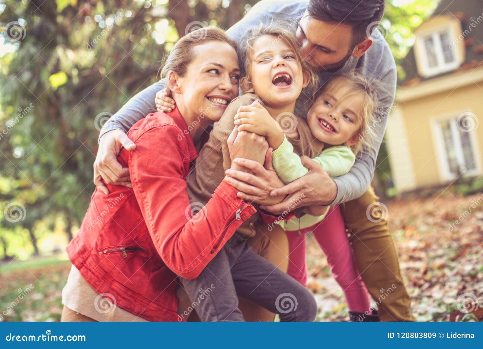 hugging itch other is funny. happy family.