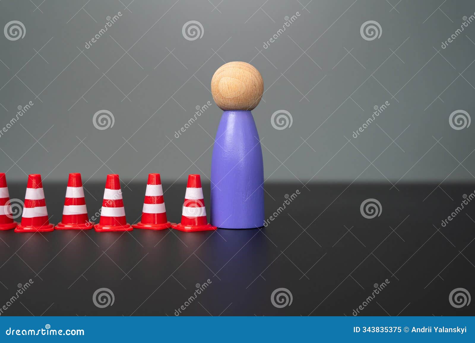 a human figure and many cones. setting the boundaries of personal space.