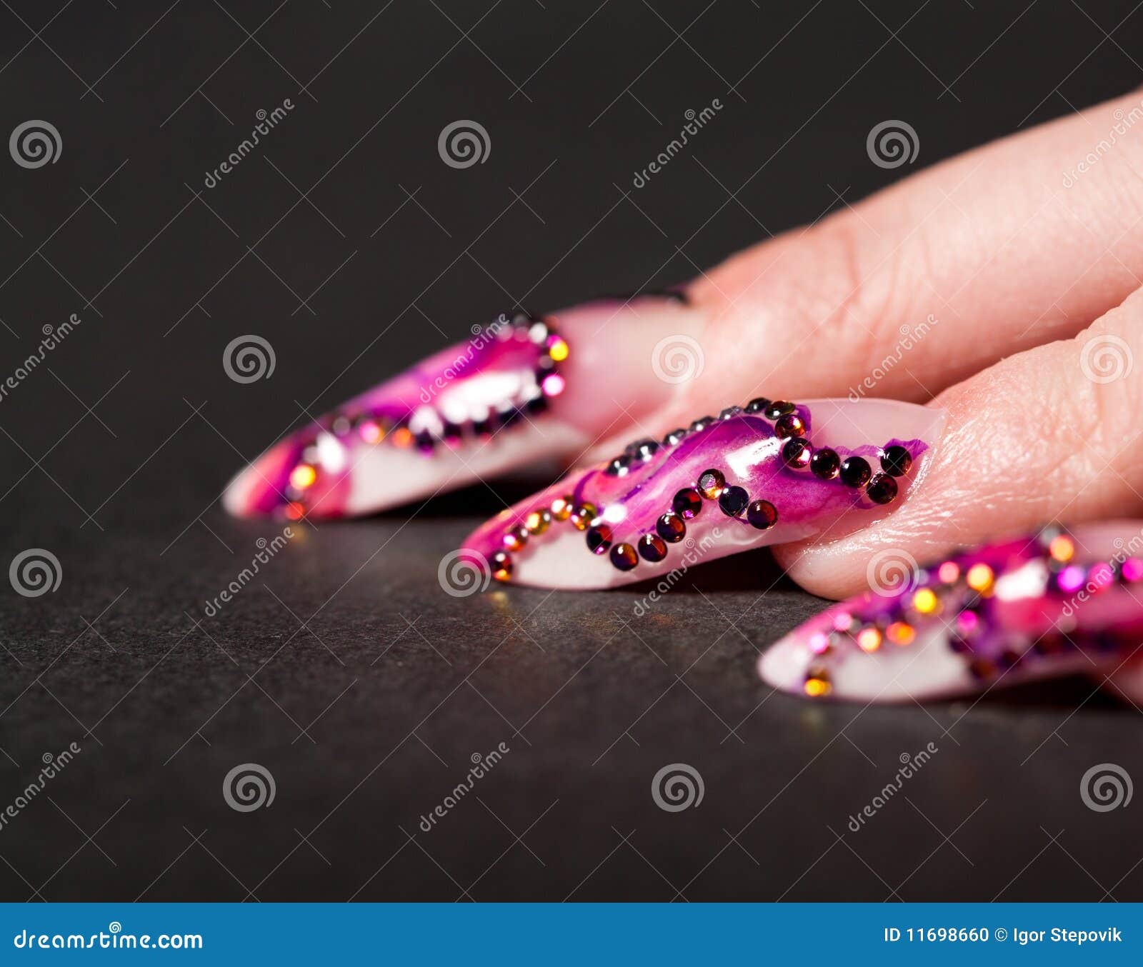 human fingers with long fingernail