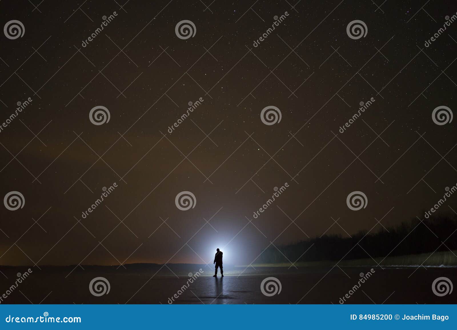 human with flashlight