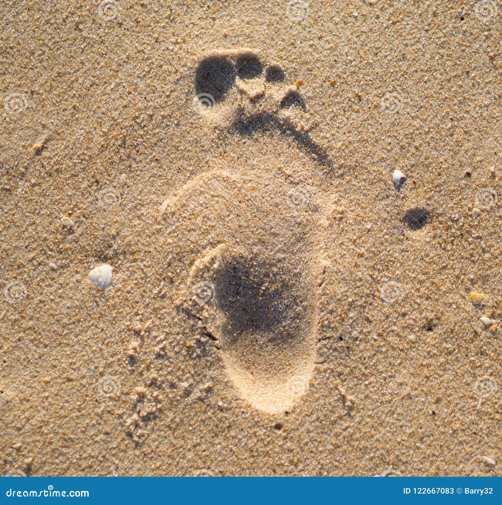 Human Footprint in Sand on Faro Beach, Algarve, Portugal. Stock Image ...