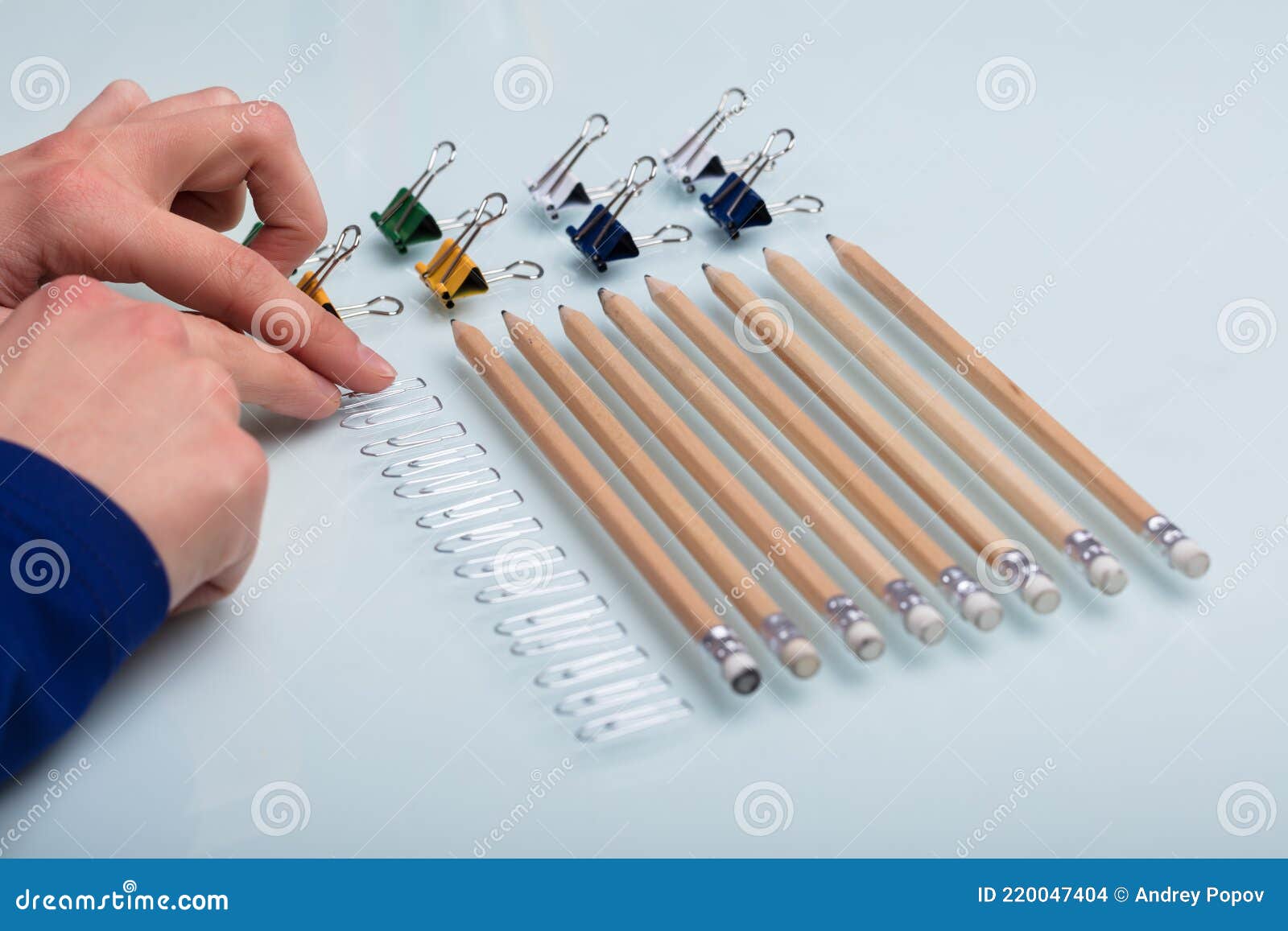 Human Hand Arranging Office Supplies Stock Photo Image of anxious