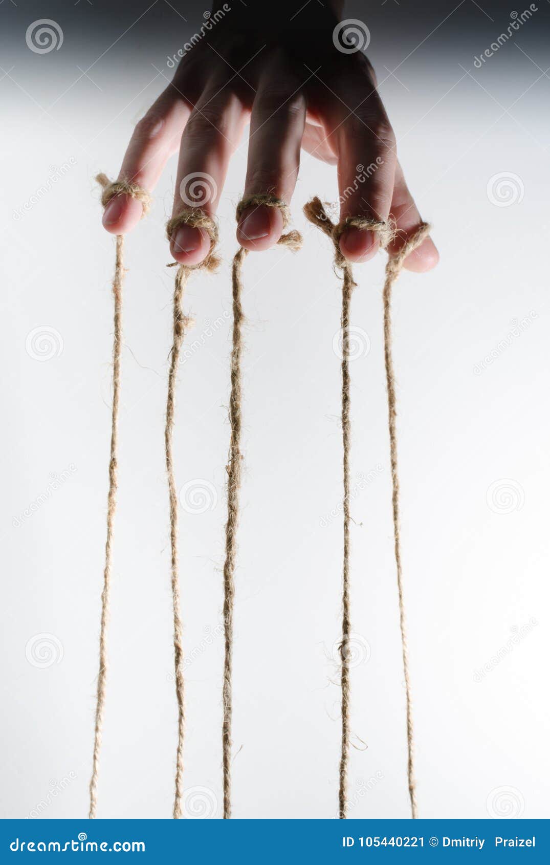 The Human Hand Controls the Puppet with the Fingers Attached To Them