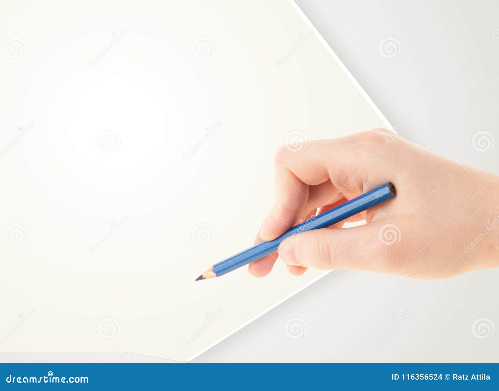 Human Hand Drawing with Pencil on Empty Paper Template Stock Photo ...