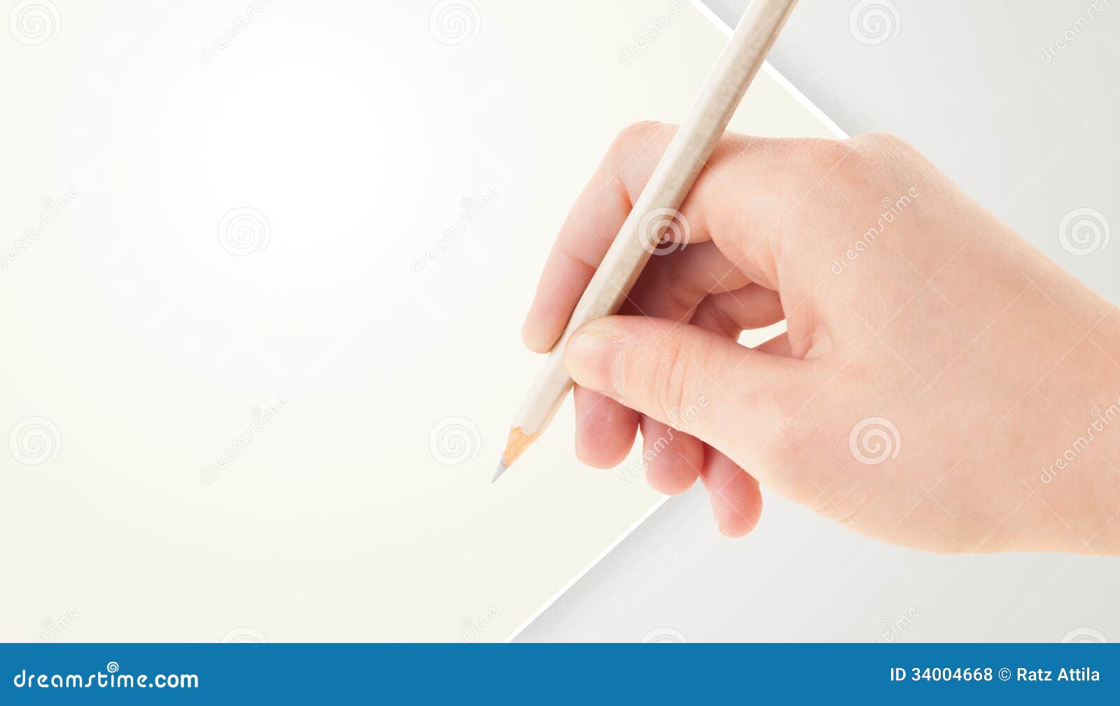Human Hand Drawing With Pencil On Empty Paper Template Stock Photo