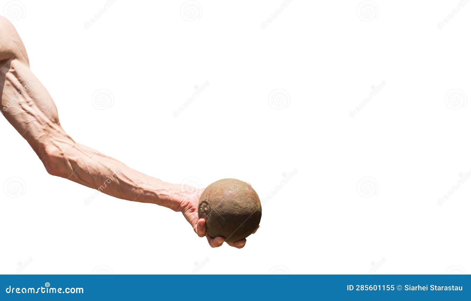 a human hand holds a metal ball