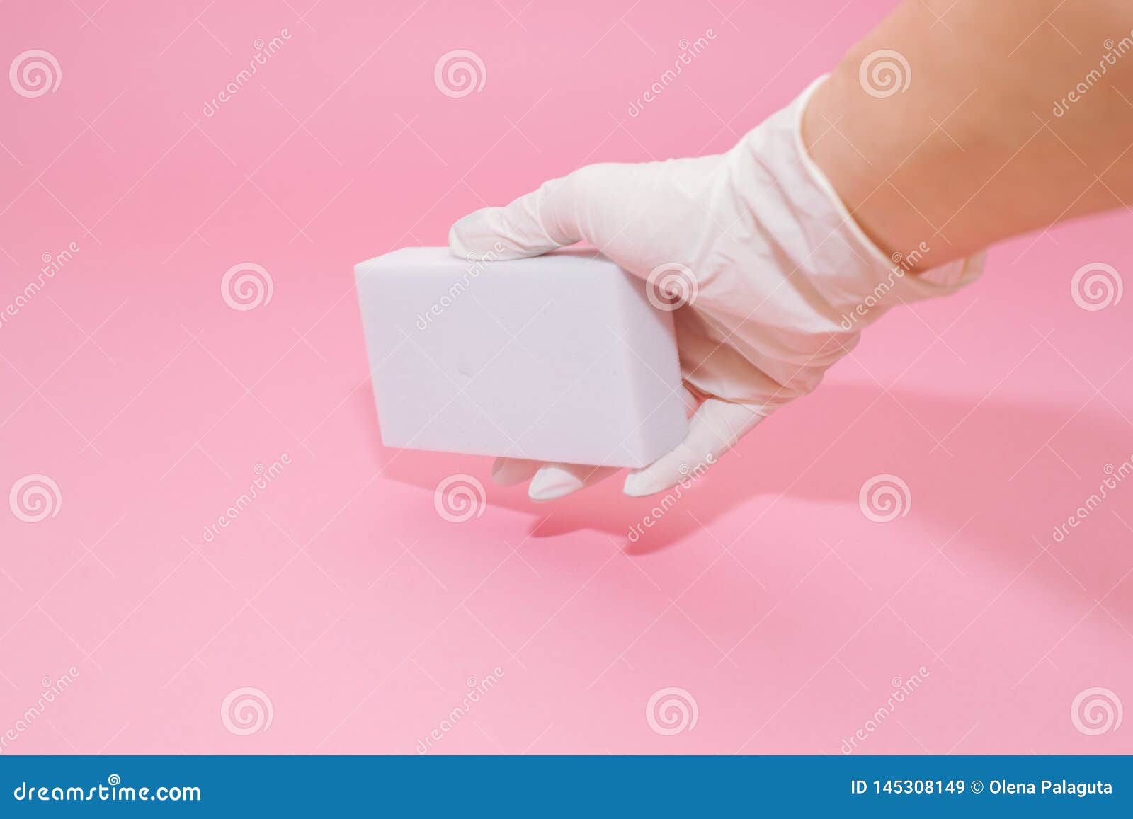 melamine sponges on pink background