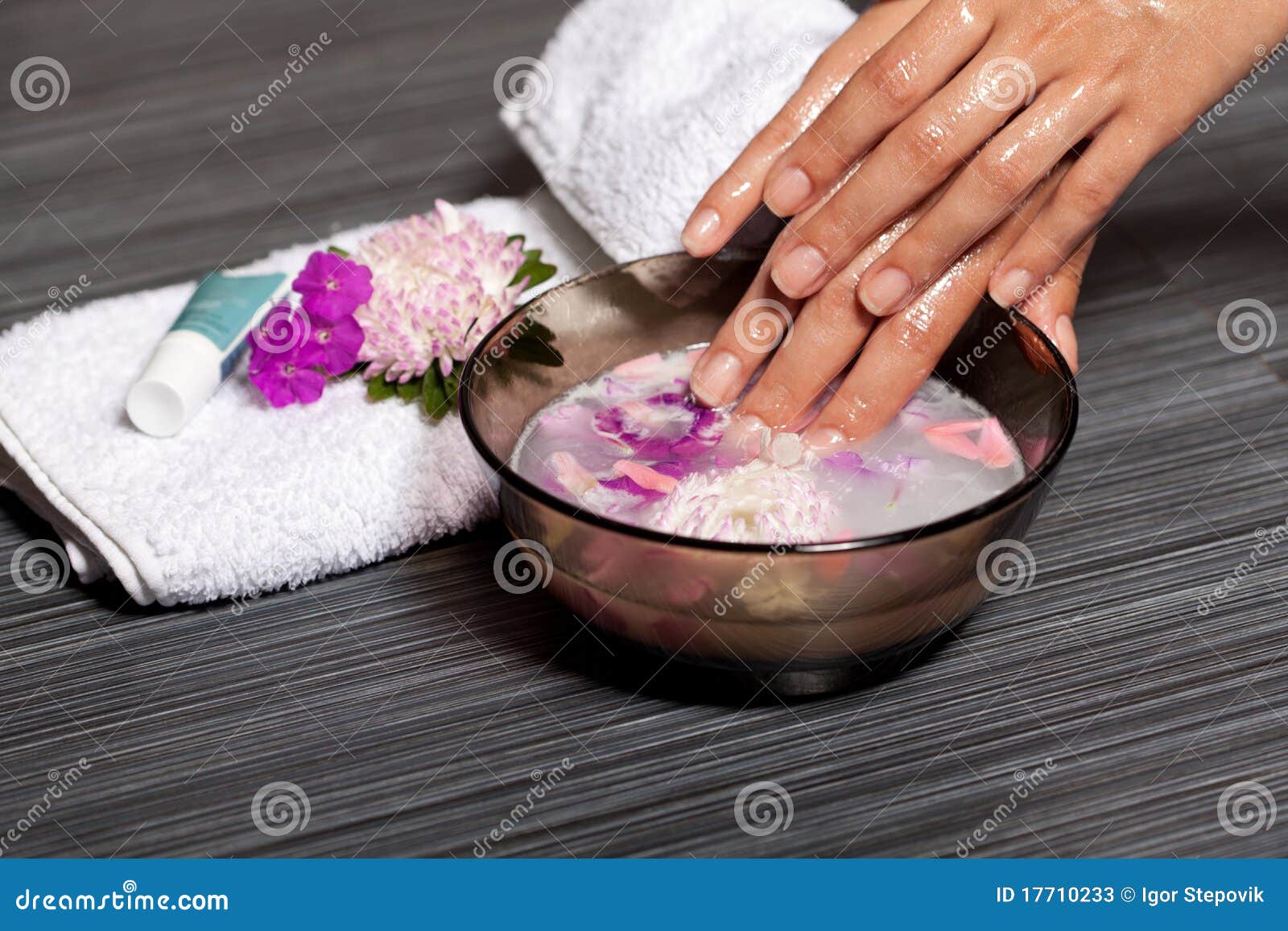 Human Hands in Bowl with Oil and Flower Stock Image Image of body