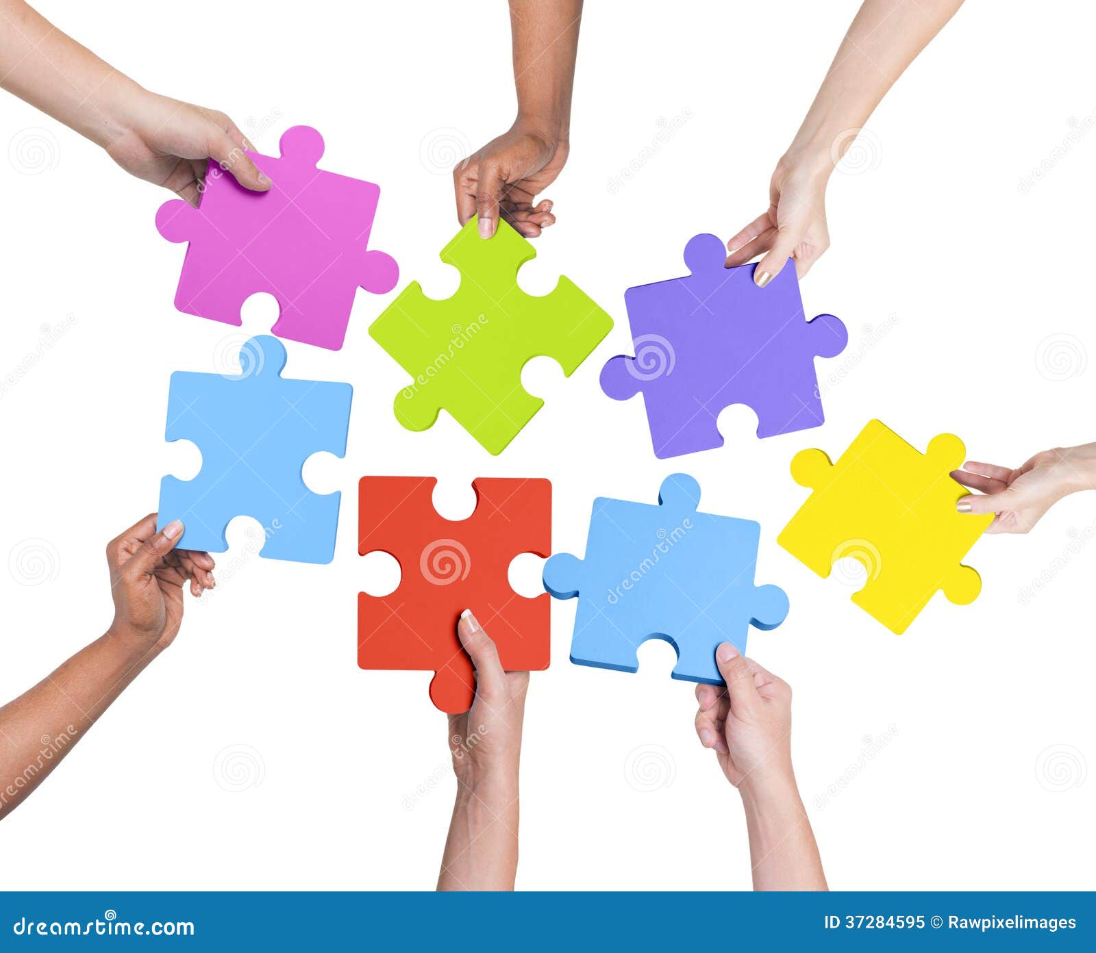 human hands holding jigsaw puzzle