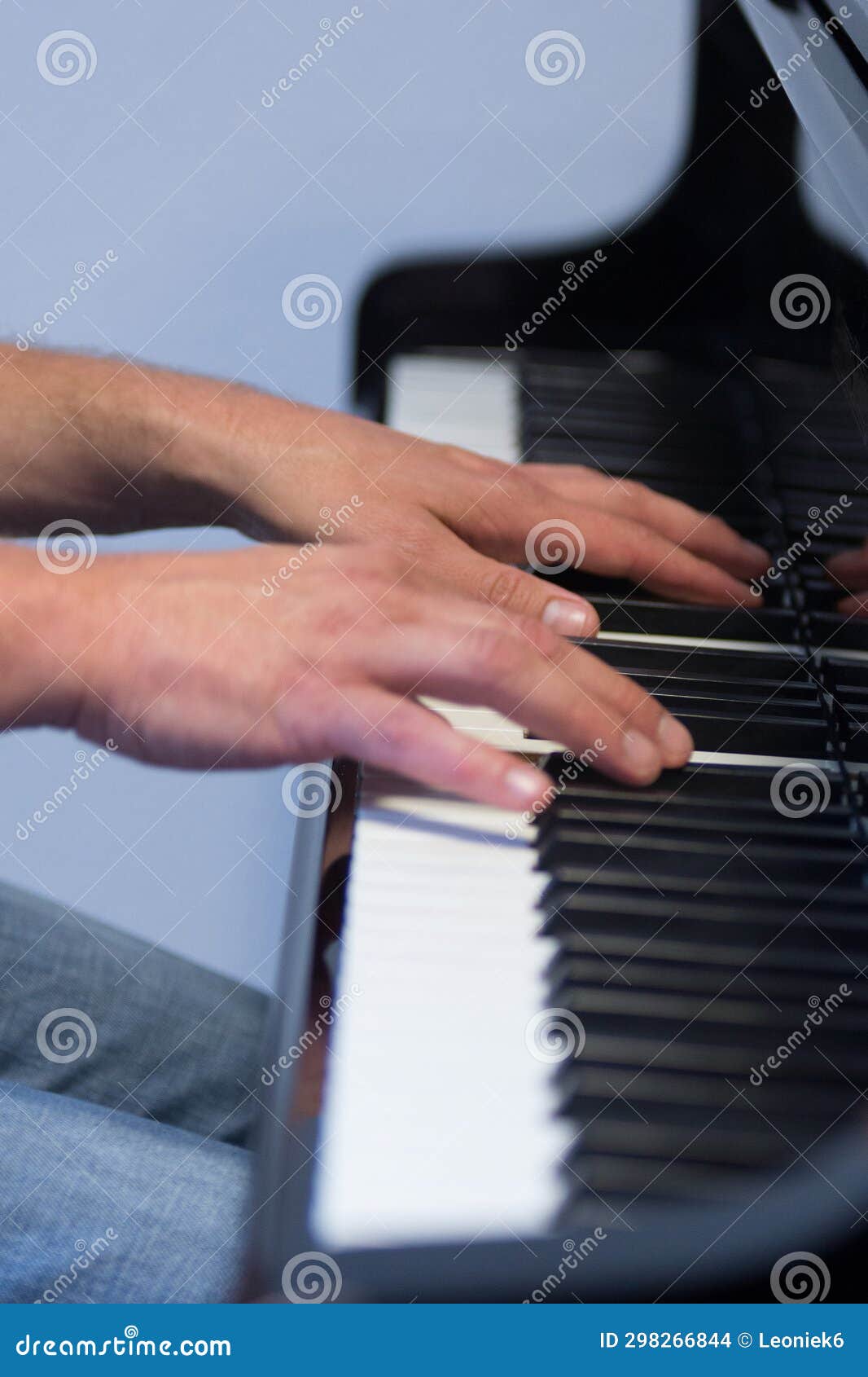 Human Hands Playing the Keys Notes and Chords on a Classic Black Piano