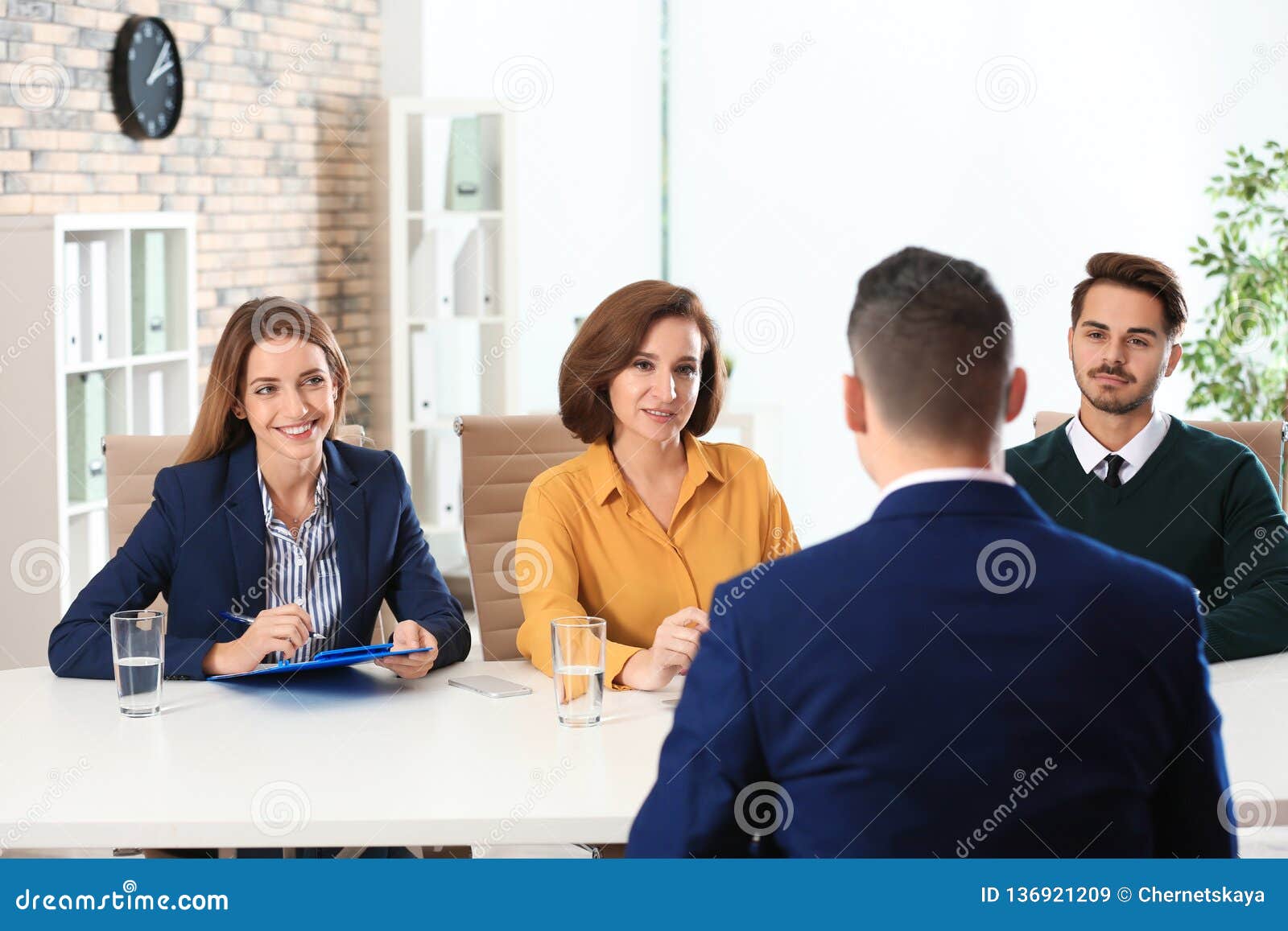 human resources commission conducting job interview with applicant