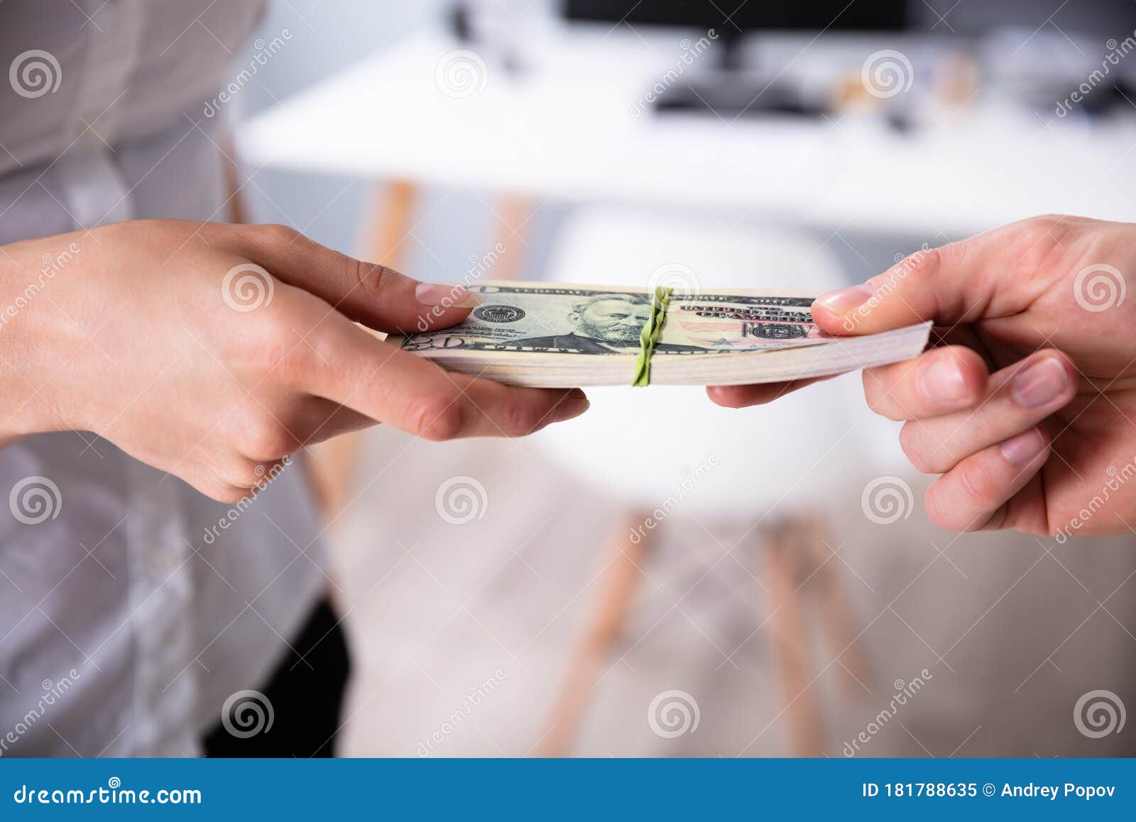 human`s hand exchanging the money