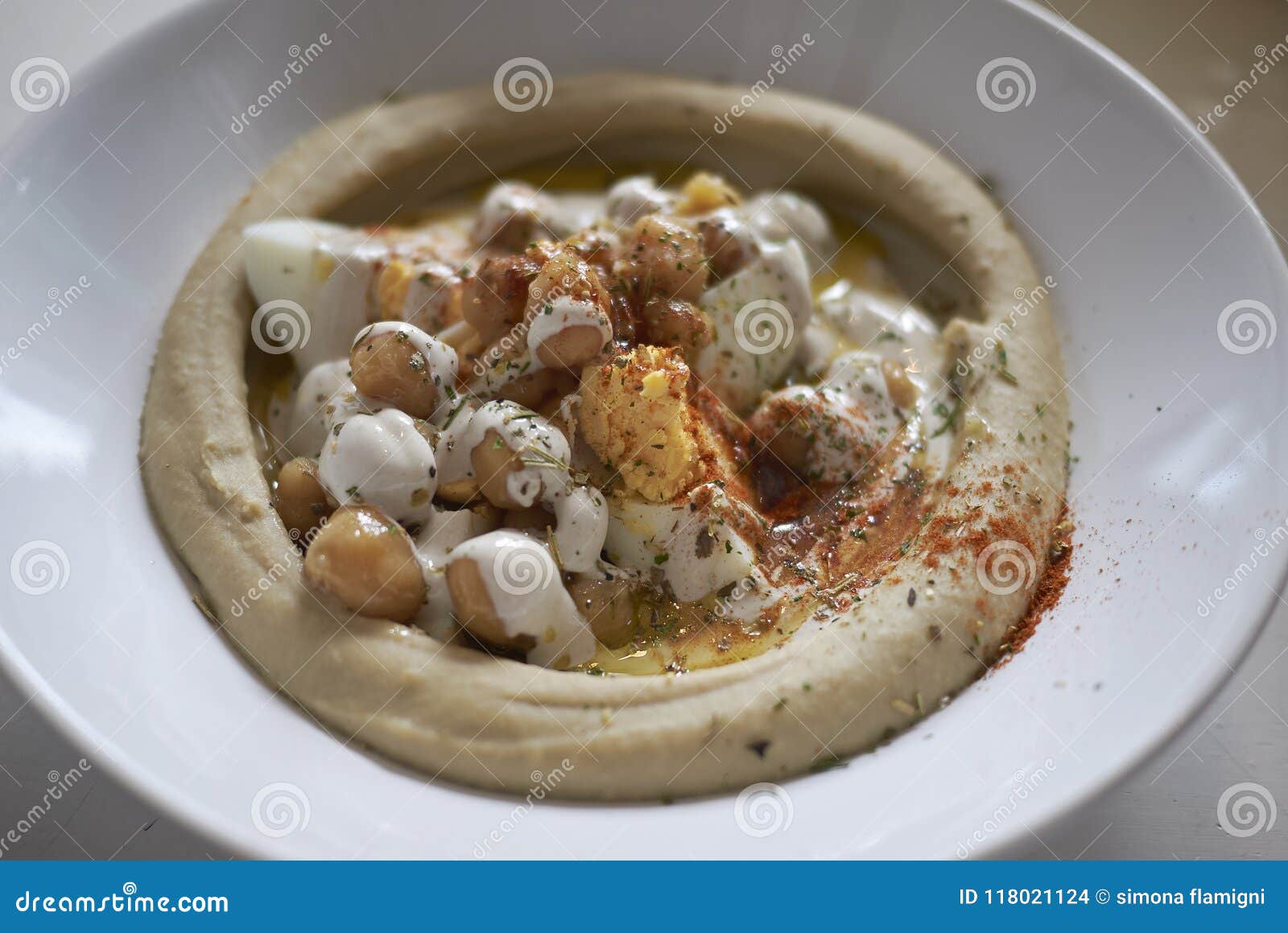 Hummus with boiled eggs stock photo. Image of nutrient 118021124
