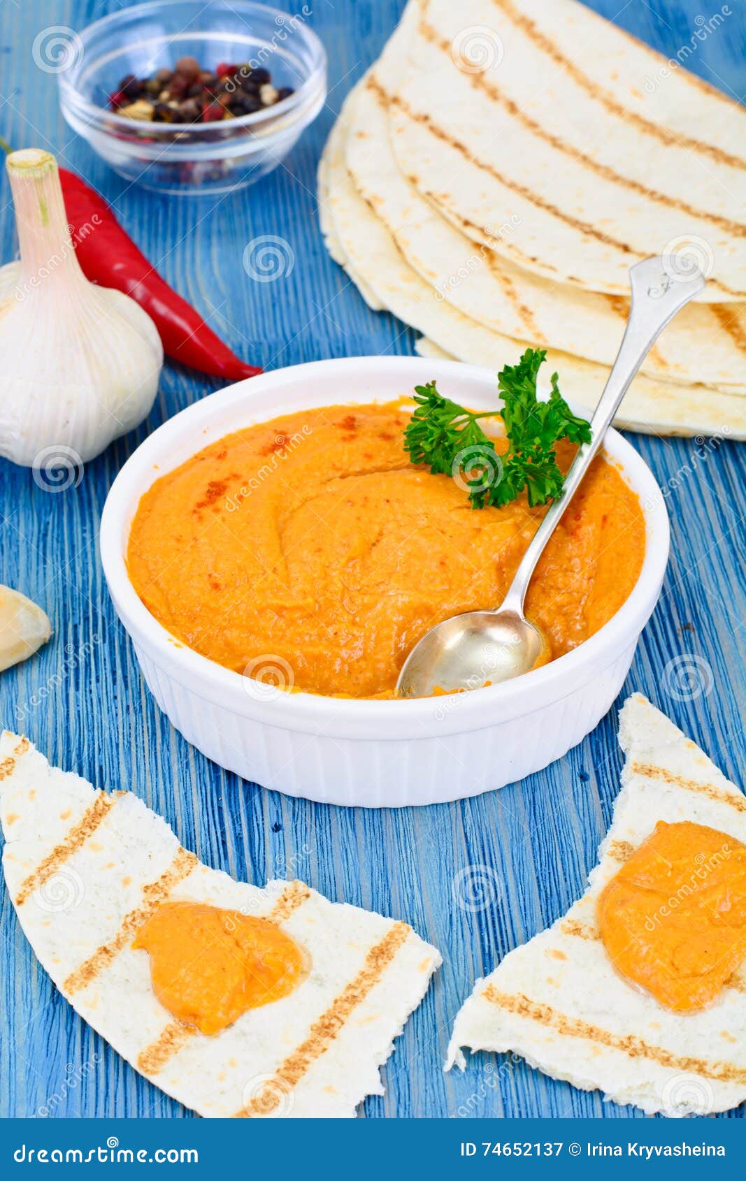 Hummus with Curry, Turmeric, Raw Chickpeas on the Boards Stock Image