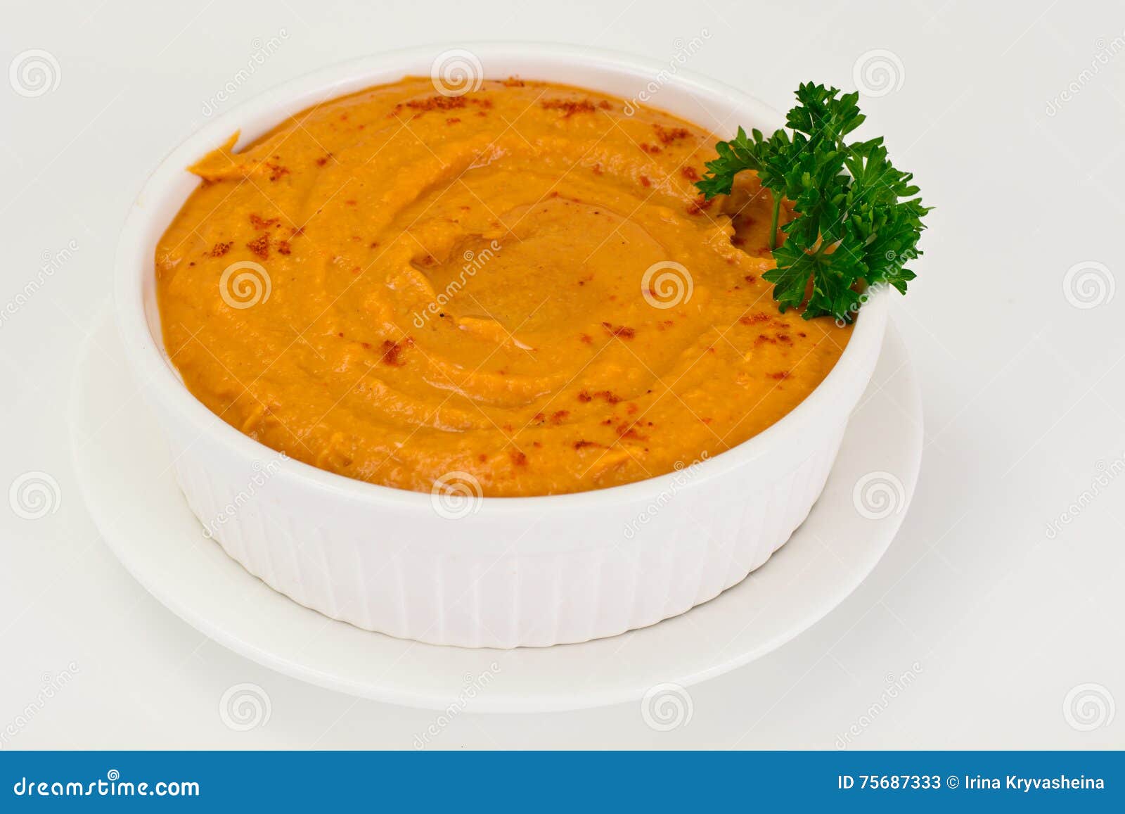Hummus with Curry, Turmeric, Raw Chickpeas on the White Background
