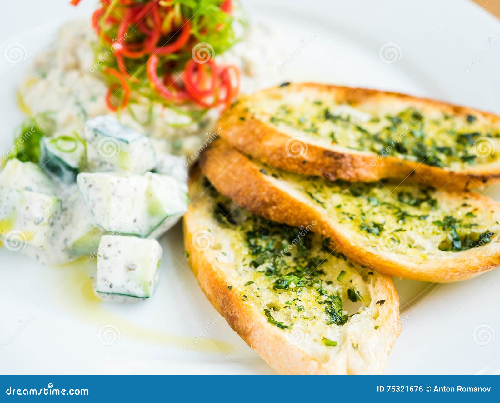 Hummus with garlic bread stock photo. Image of lemon 75321676