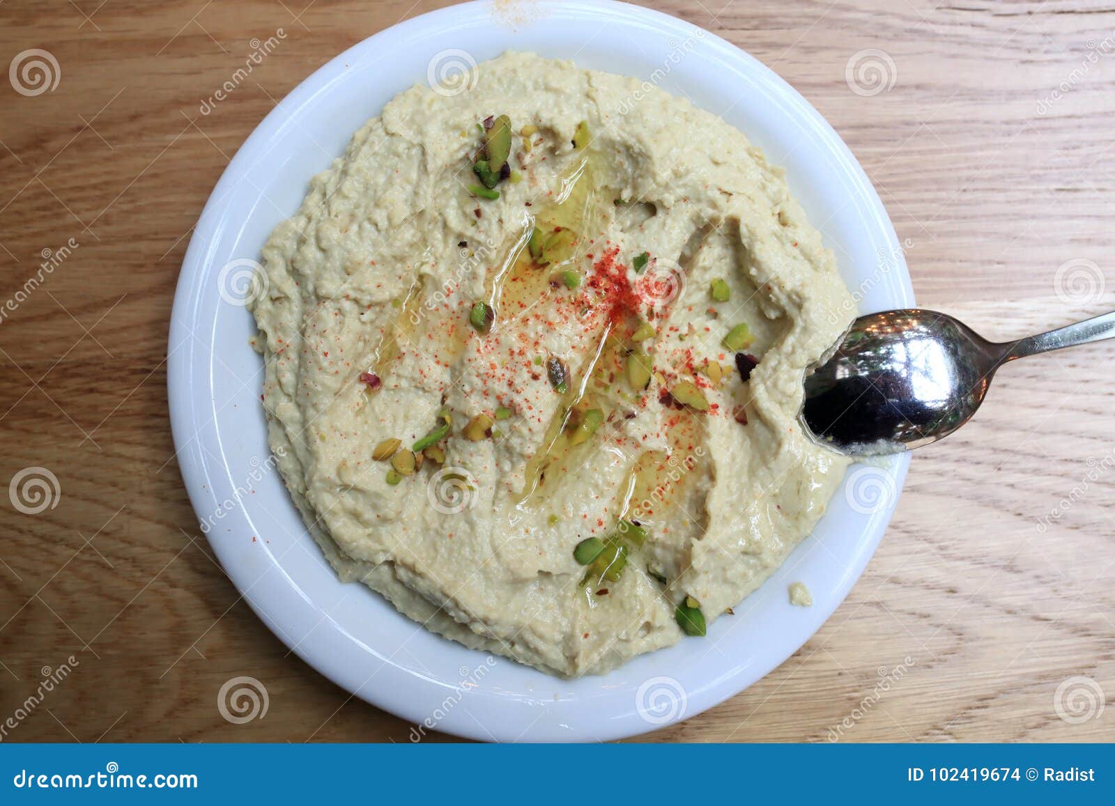 Hummus on plate stock photo. Image of paprika, nutrition 102419674