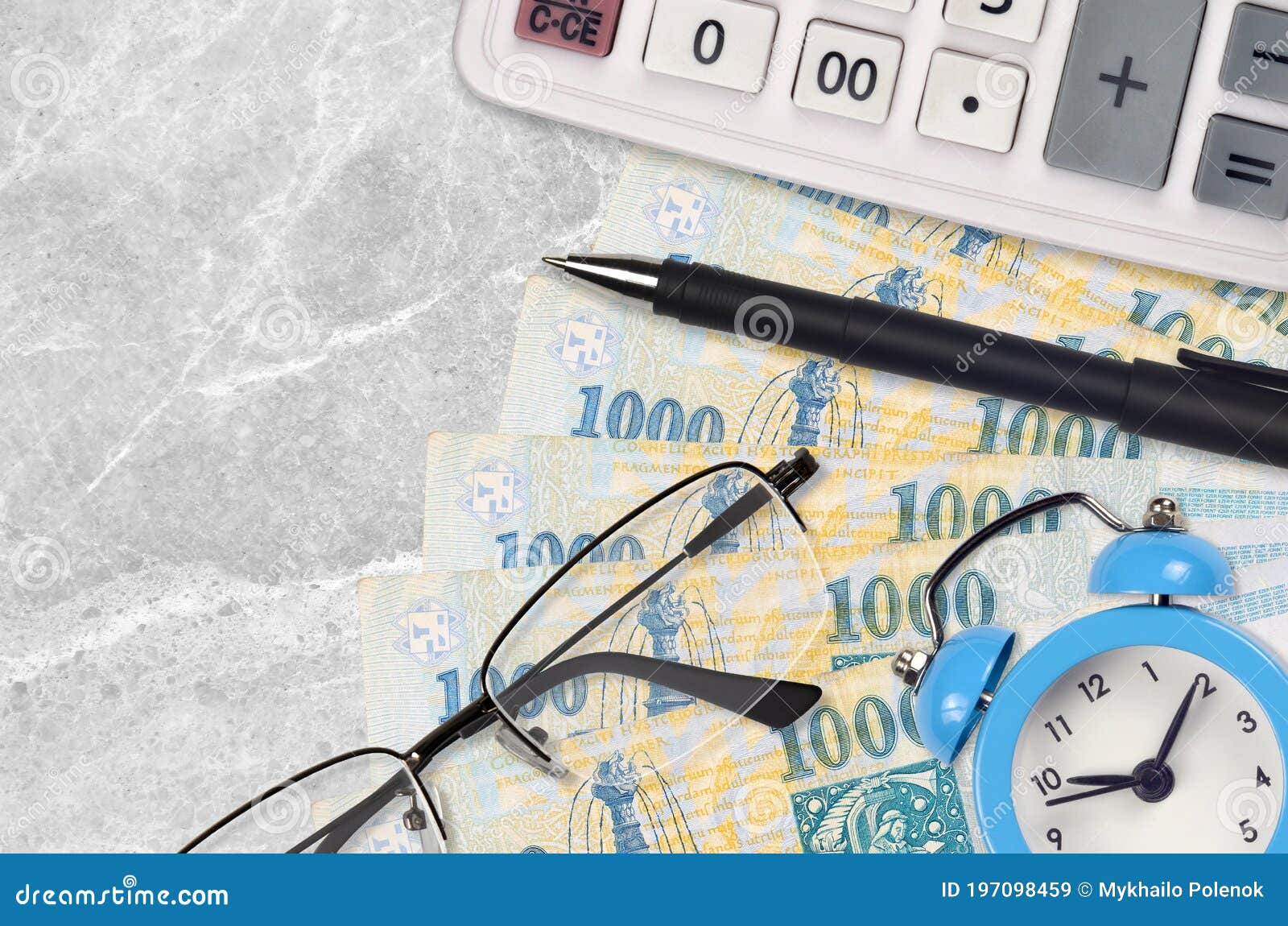 1000-hungarian-forint-bills-and-calculator-with-glasses-and-pen