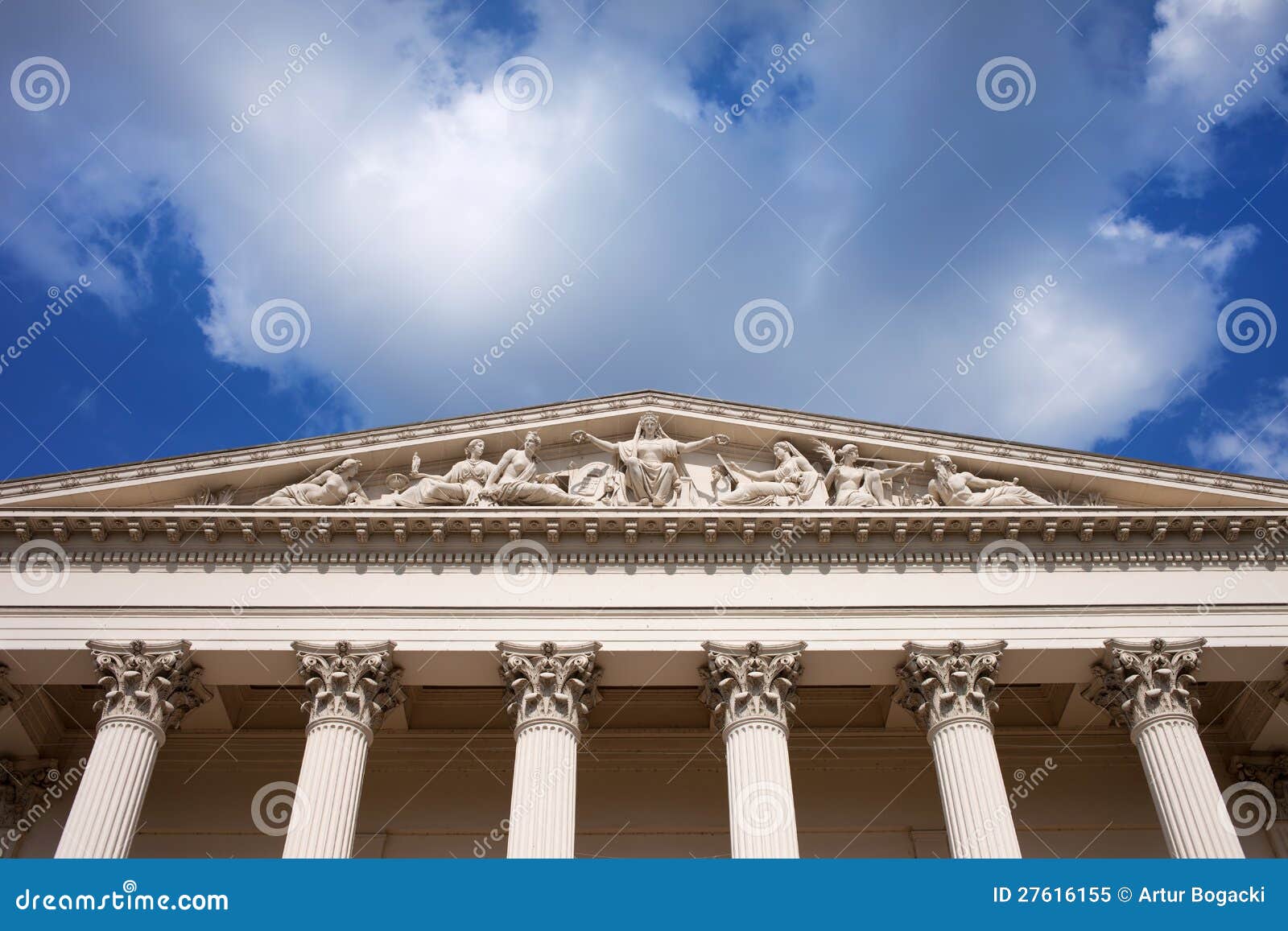 Neoclassical, 19th century Hungarian National Museum architectural details, tympanum with reliefs within triangular pediment on Corinthian columns in Budapest, Hungary.