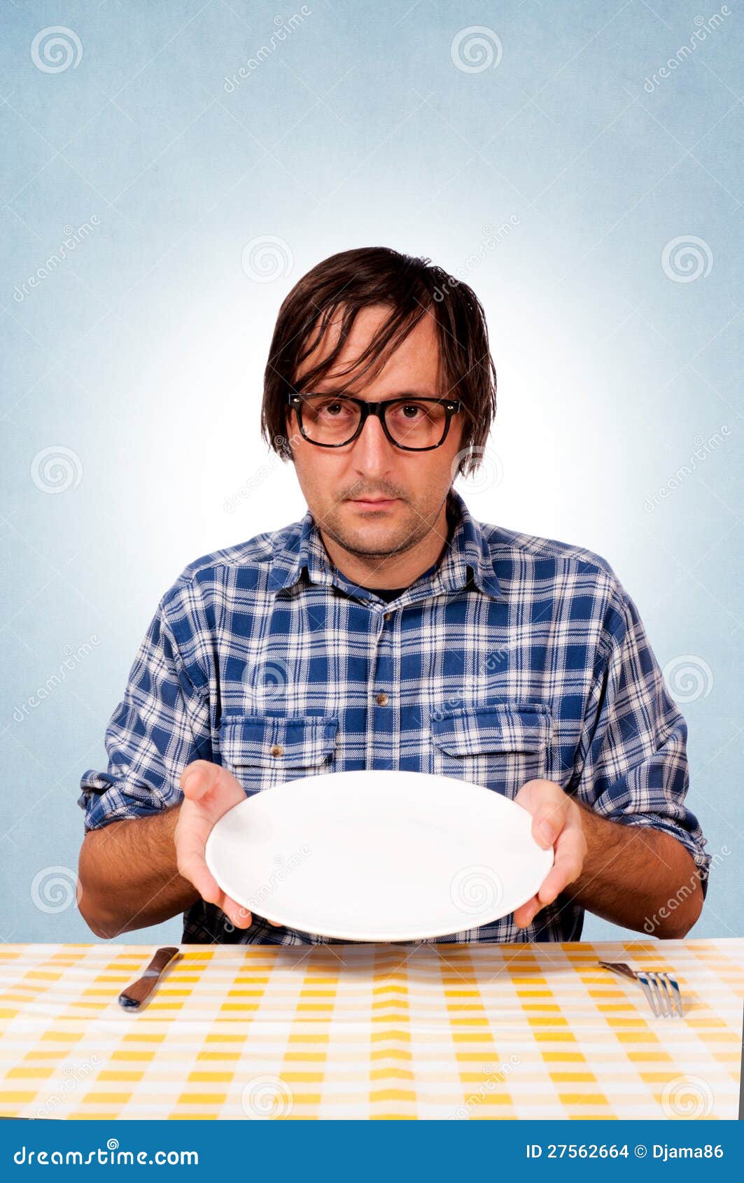 A hungry man stock photo. Image of eating, knife, kitchen - 27562664