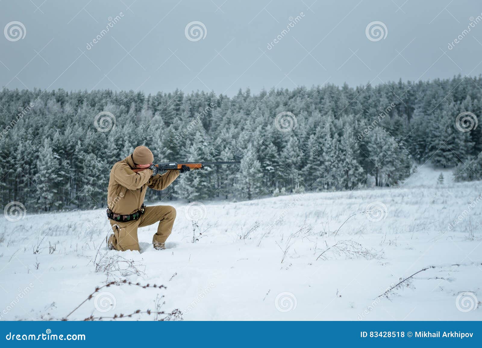 Hunter Man Dressed in Camouflage Clothing Standing in the Winter Stock ...