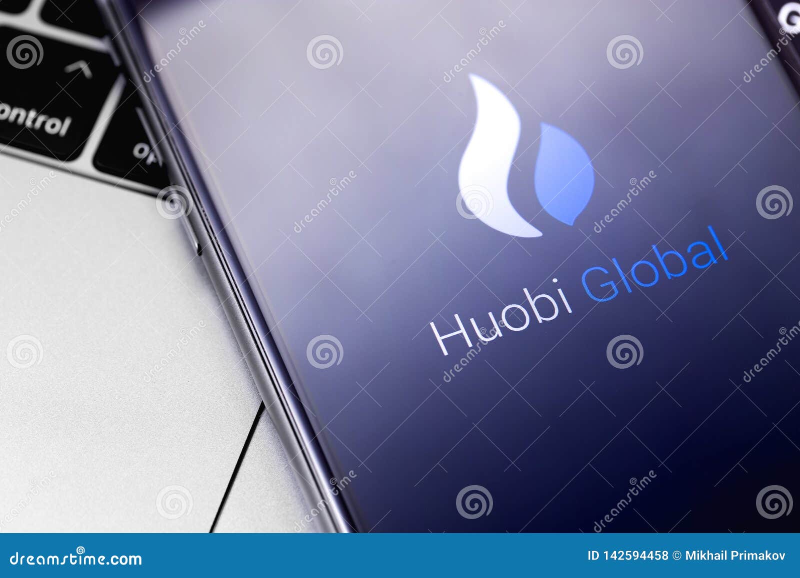 Huobi App On The Screen Smartphone And Notebook Editorial ...