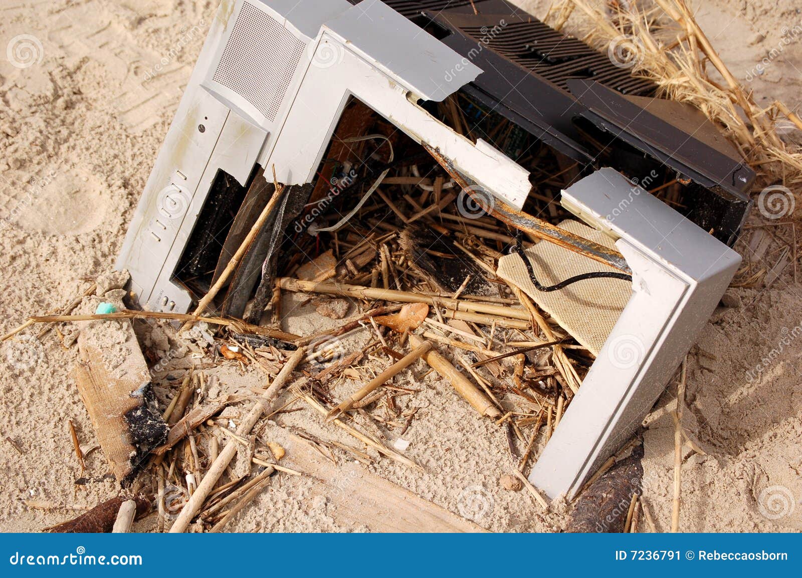 Hurricane Damage. A ruined TV set that was washed up on the beach after a Hurricane Ike.