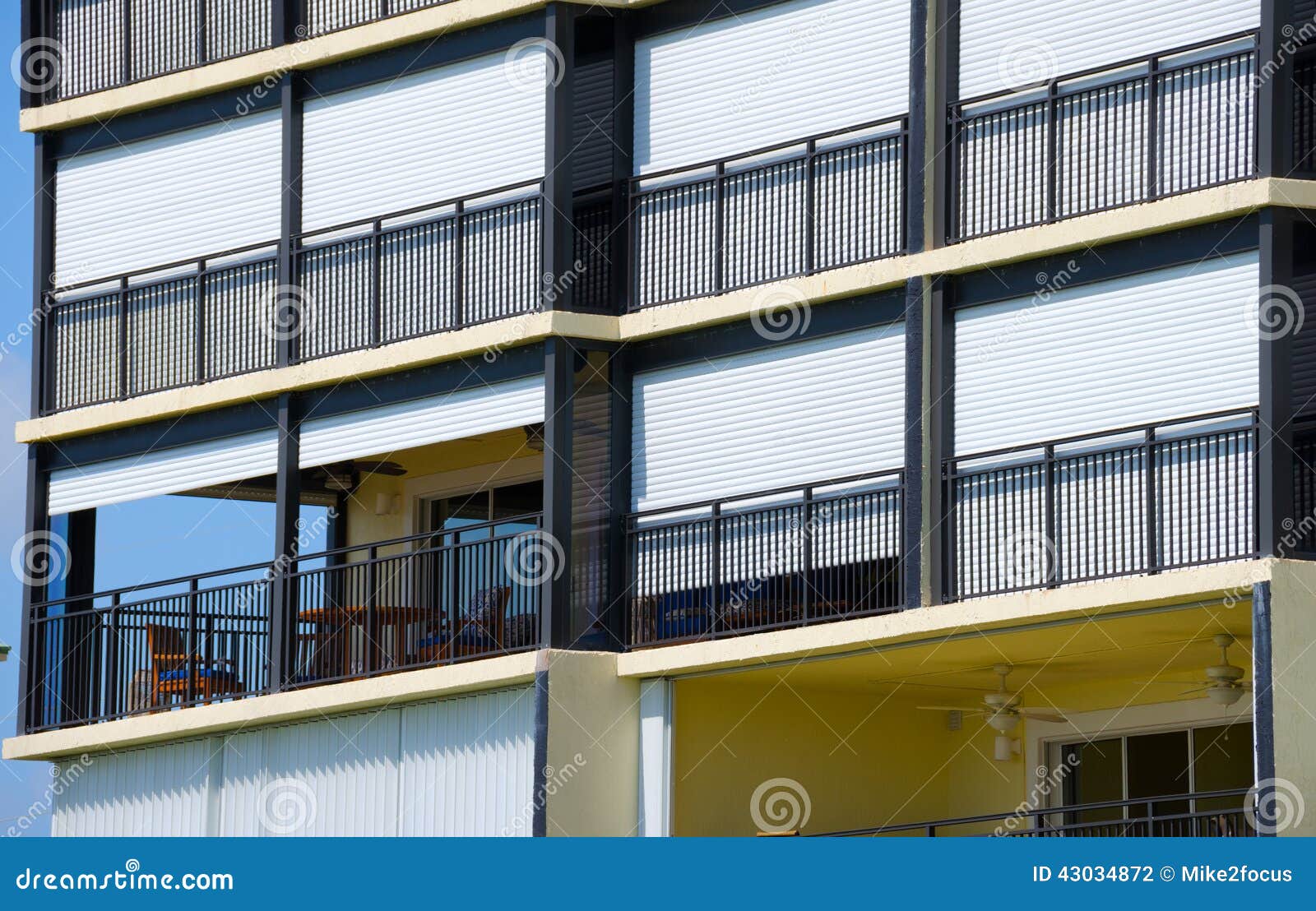 hurricane shutters on large building