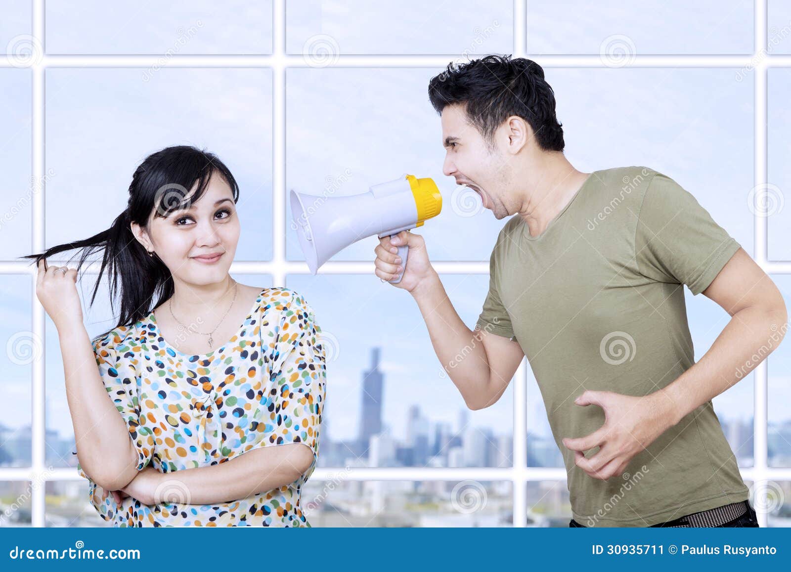 Husband Angry At Wife Using Megaphone Stock Image