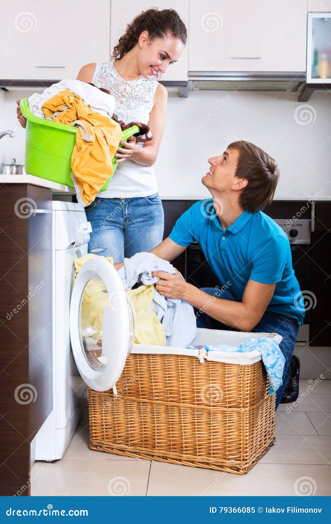 Husband Helping Happy Housewife