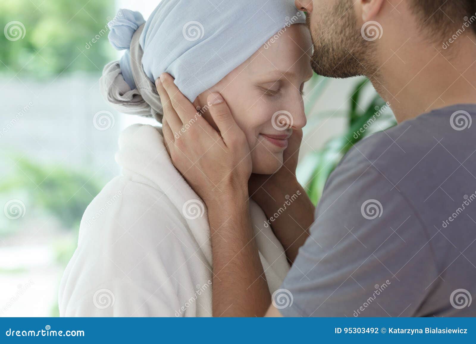 Husband kissing his wife stock photo. Image of cancer - 95303492