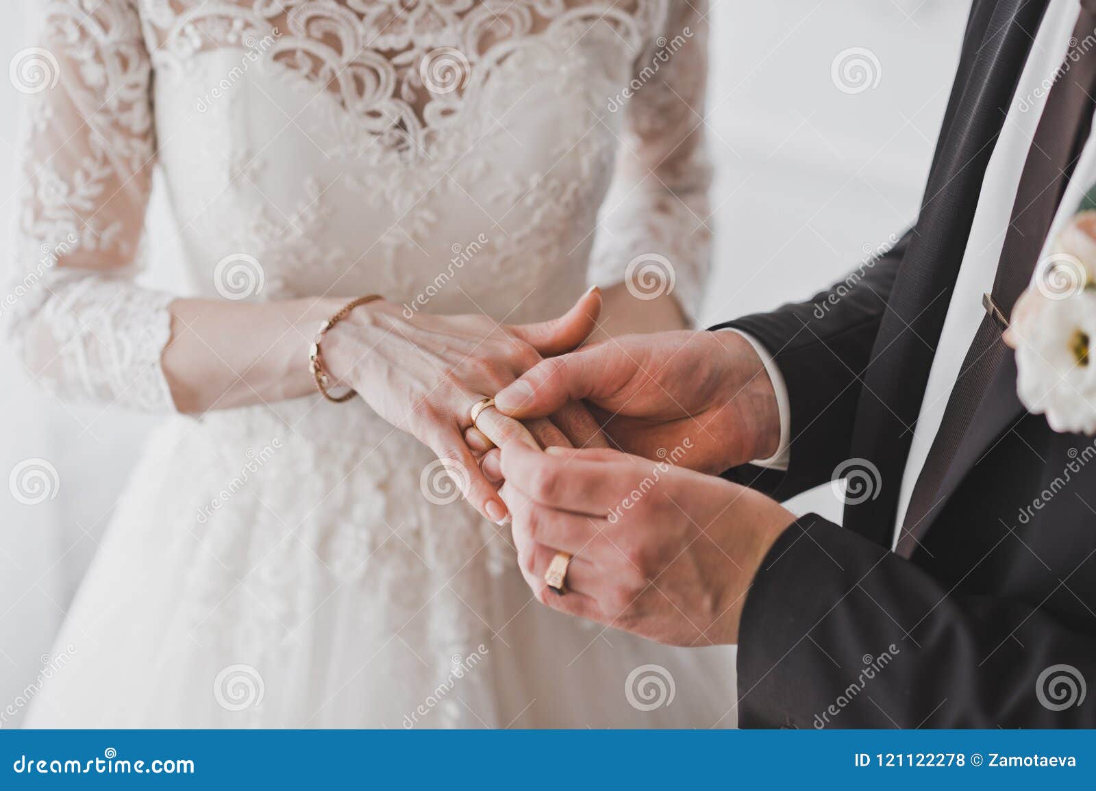 The Husband Puts His Wifes Wedding Ring On The Ring Fing