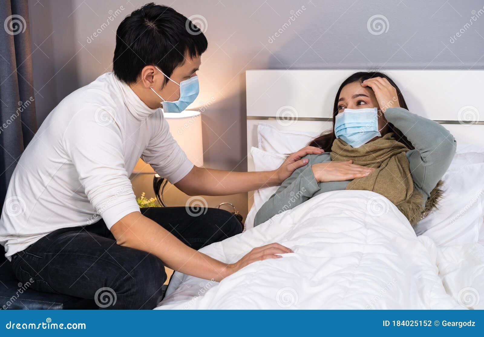 Husband Take Care His Sick Wife On Bed At Home People Must Be Wearing