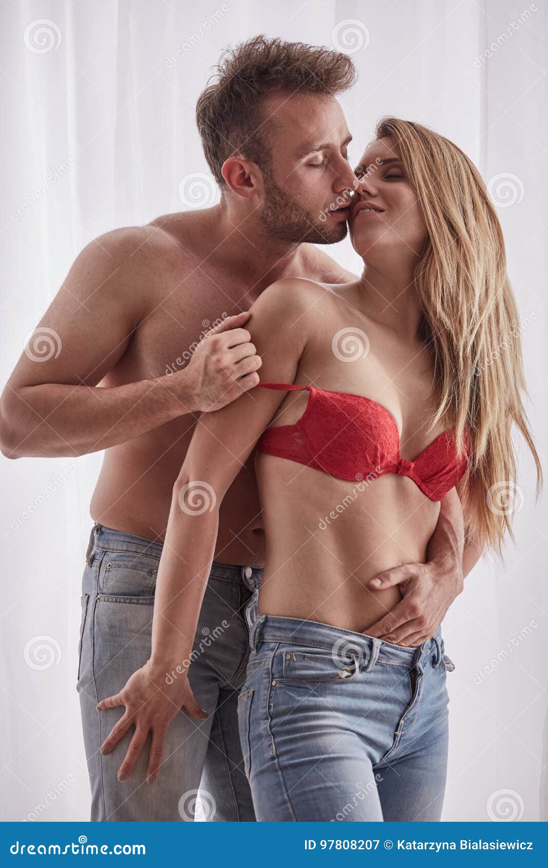 Husband Undressing His Wife Stock Image