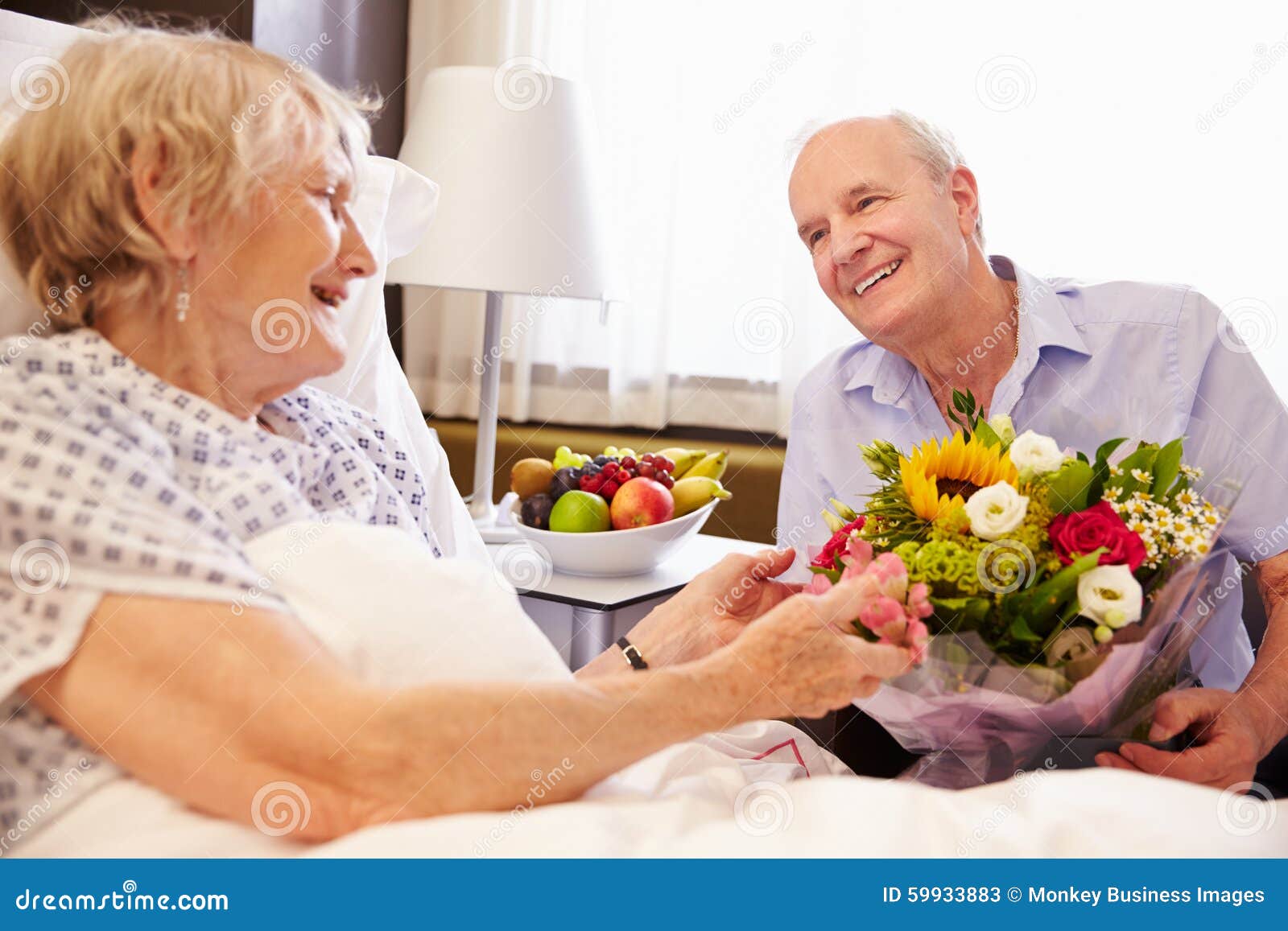 Husband Visiting Senior Wife Hospital Flowers Photos image