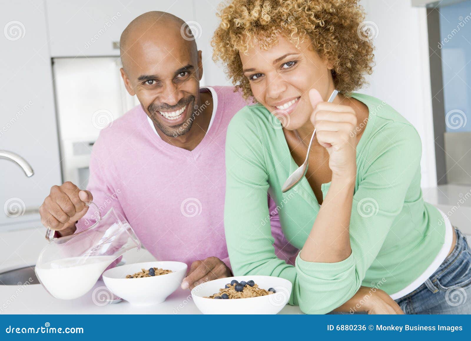 Husband And Wife Eating Breakfast Together Royalty Free 