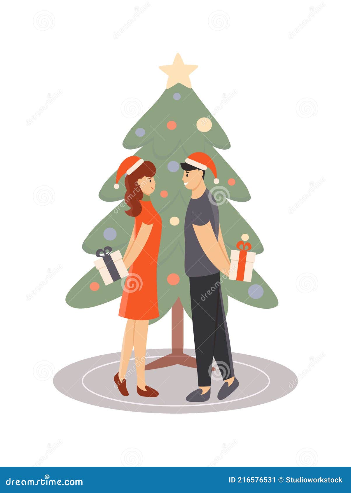 Husband and Wife Exchange Christmas Gift Near Xmas Tree Stock pic
