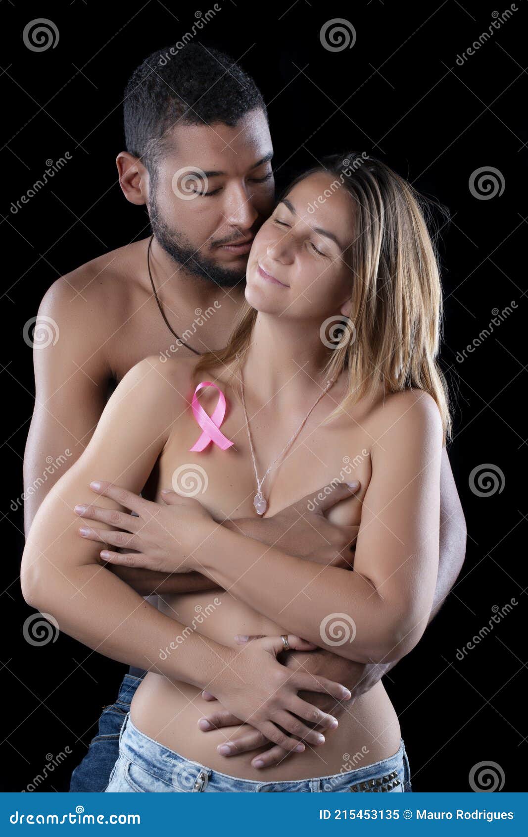 Husband and Wife Hugging for Breast Cancer Stock Image