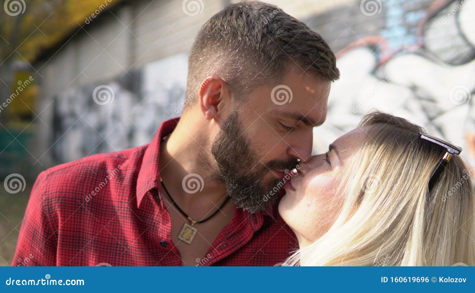 Husband and Wife Kissing Like First Time